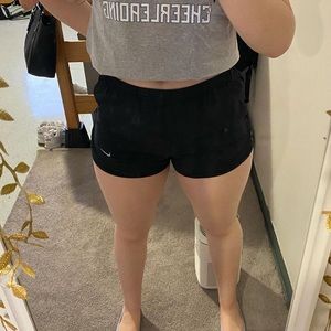 Black Nike running shorts